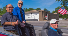 Ray Rhode drives Cleveland TV personalities Big Chuck and Little John in a Memorial Day parade earlier this year. Photo courtesy of auto:haus Image