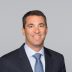 Professional photo of Tom Telesco smiling.