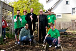 May 2011, at Cultivating Community Day with Saint Ignatius High School President William J. Murphy, S.J., and volunteers from Ignatius and JCU communities, in honor of our shared 125th anniversary year.