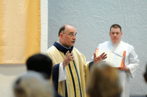 Delivering the homily at the Silver Circle Mass in April 2009.