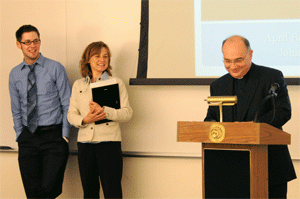 April 2009, presenting the Charles J. Ping Student Service Award to Jimmy Rudyk ’10, for leadership in community service. Lesha Farias (center) represents Ohio Campus Compact, which administers Ping funding from State Farm Insurance.