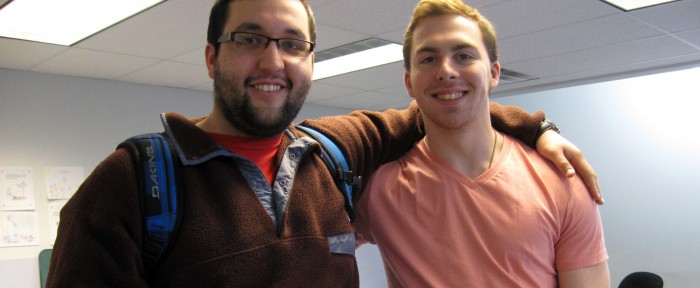 Smiling student with arms around each other